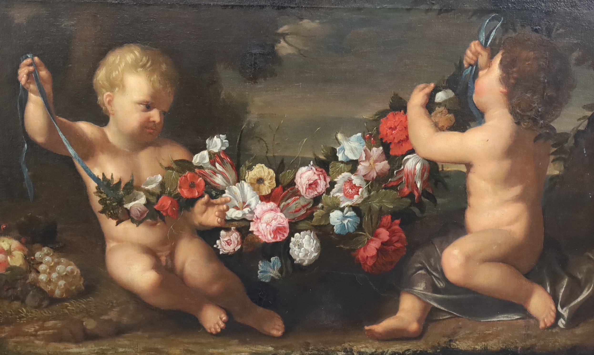 17th Century Roman School, Two putti holding a garland of flowers, oil on canvas, 76 x 118cm.